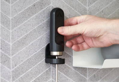 NanoFoamer stored on the included adhesive wall mount